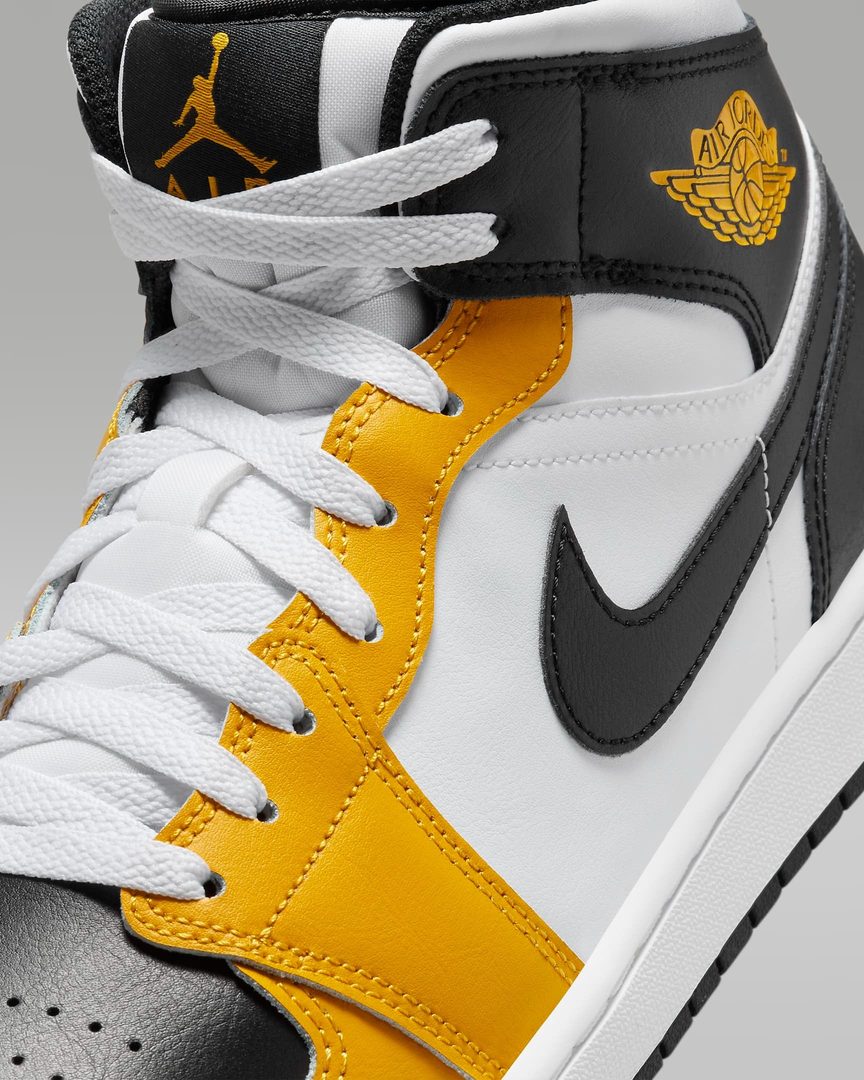 Jordan air 1 mid yellow deals